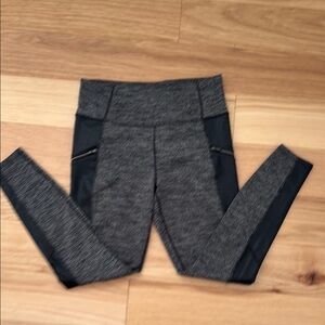 Athleta leggings, faux leather panels, black and white size medium